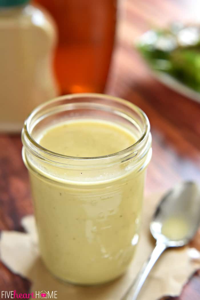 Mason jar with ingredients in background.