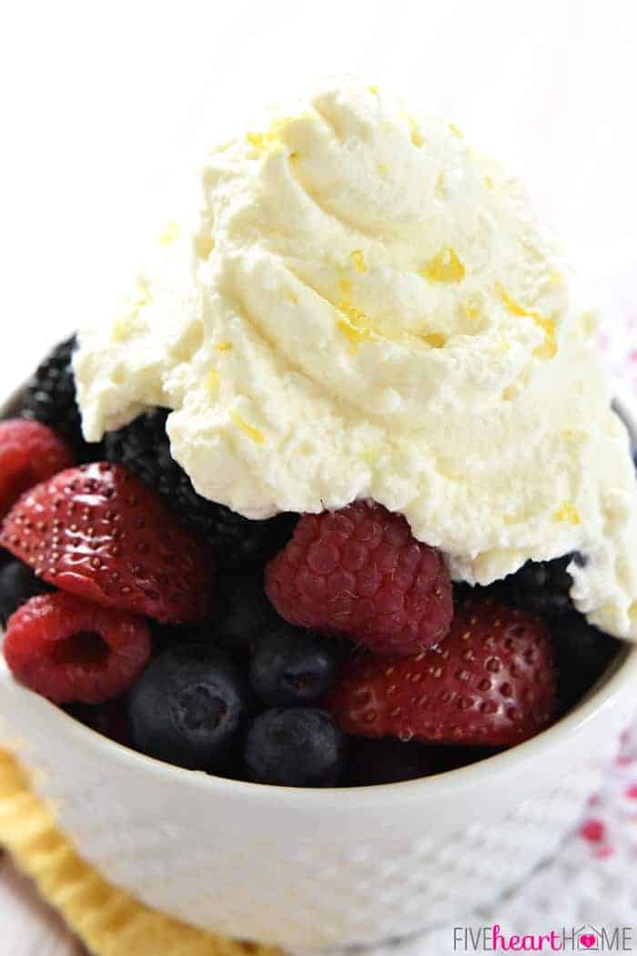 Close-up of Lemon Whipped Cream over berries.