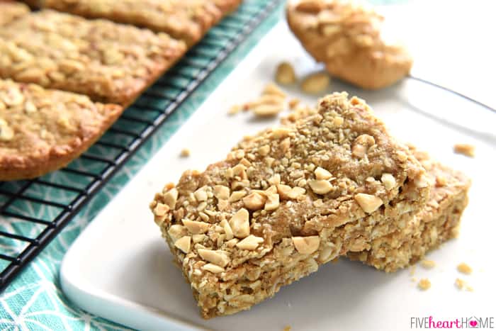 Peanut Butter Oatmeal Bars ~ loaded with wholesome oatmeal and whole wheat flour, flavored with peanut butter, and sweetened with honey, these soft-baked oatmeal bars make a yummy, on-the-go breakfast or snack! | FiveHeartHome.com Peanut Butter Oatmeal Bars on white plate and wire rack.