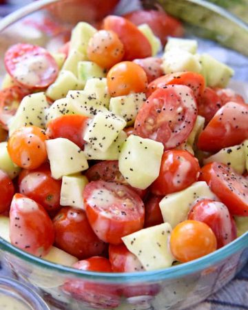 Tomato Cucumber Poppyseed Salad ~ juicy tomatoes and crisp cucumbers are tossed with a sweet and tangy dressing for a fresh and healthy summertime side dish recipe! | FiveHeartHome.com