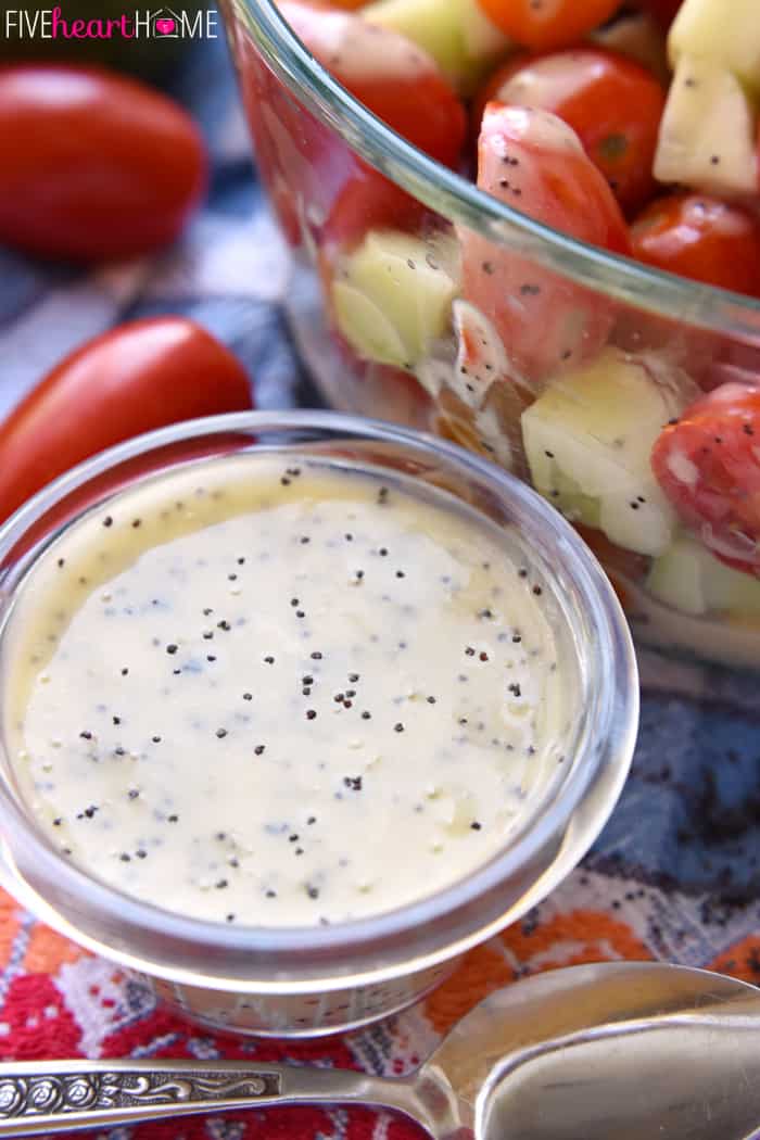 Bowl of Poppy Seed Dressing next to salad.