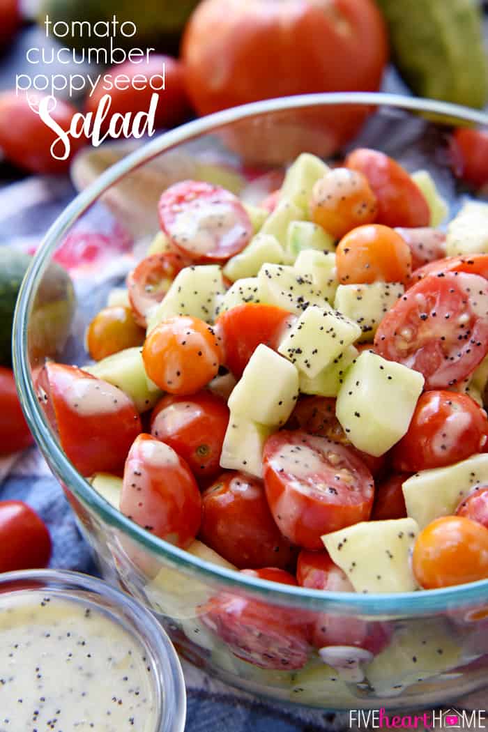 Big glass bowl of Tomato Cucumber Poppy Seed Salad.