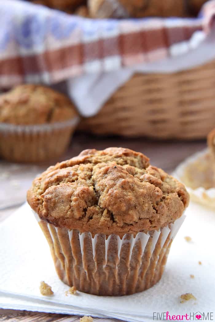 Spiced Oatmeal Muffins ~ perfectly flavored with crunchy tops and pillowy centers, these muffins are a wholesome, delicious breakfast on-the-go or anytime snack! | FiveHeartHome.com Close-up of Oatmeal Muffin on a napkin.