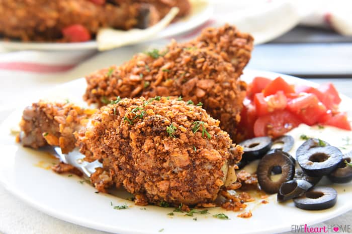 Taco Baked Chicken ~ tender and juicy on the inside with a crunchy coating of taco-seasoned tortilla chips, this Tex-Mex twist on baked chicken is a simple and delicious dinner for any night of the week! | FiveHeartHome.com