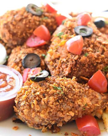 Taco Baked Chicken ~ tender and juicy on the inside with a crunchy coating of taco-seasoned tortilla chips, this Tex-Mex twist on baked chicken is a simple and delicious dinner for any night of the week! | FiveHeartHome.com