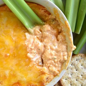 Buffalo Chicken Dip with celery stick dipper.