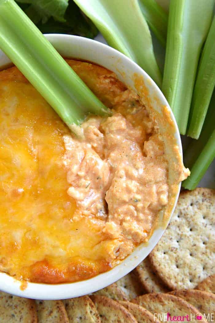 Buffalo Chicken Dip with celery stick dipper.