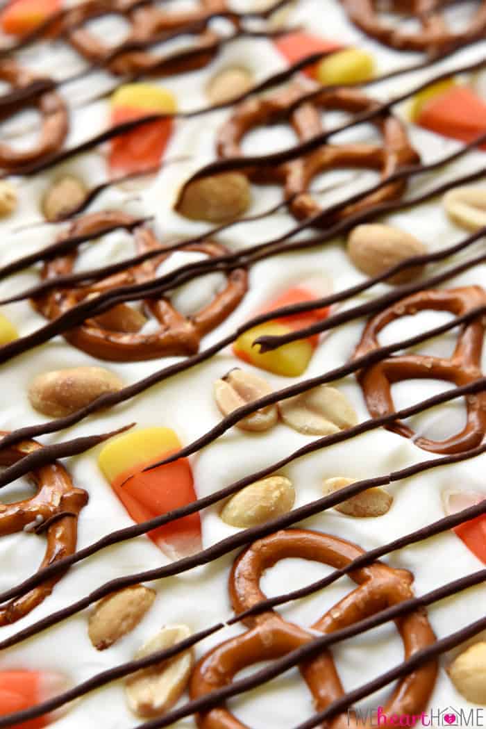Halloween Bark Recipe with candy coarn, pretzels, and peanuts