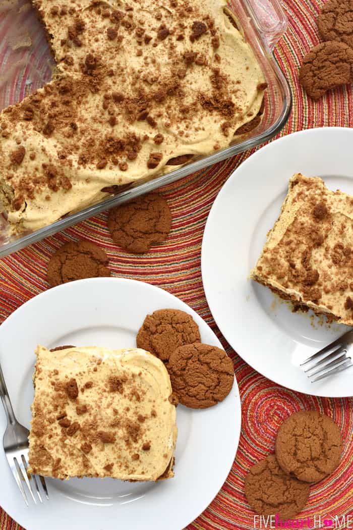 Aerial view of icebox cake in dish and on plates with gingersnaps scattered around