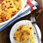 Cheesy Scalloped Potatoes with Ham ~ thin slices of potatoes drizzled with cream and layered with ham and cheddar for a decadent comfort food recipe that's also a great way to use up leftover holiday ham! | FiveHeartHome.com