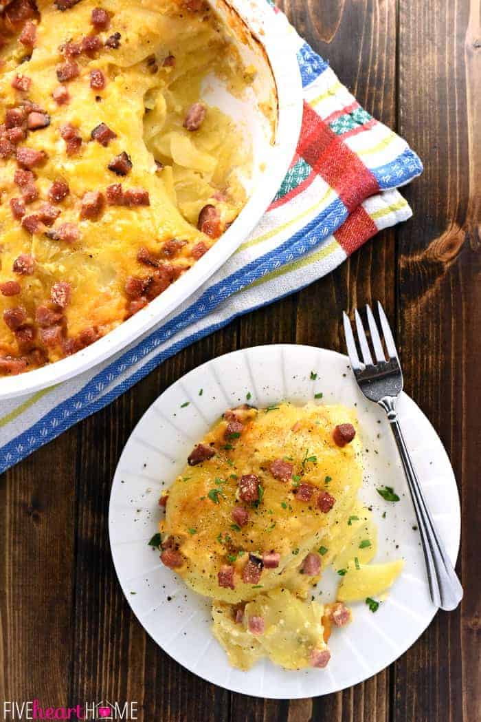 Cheesy Scalloped Potatoes with Ham ~ thin slices of potatoes drizzled with cream and layered with ham and cheddar for a decadent comfort food recipe that's also a great way to use up leftover holiday ham! | FiveHeartHome.com