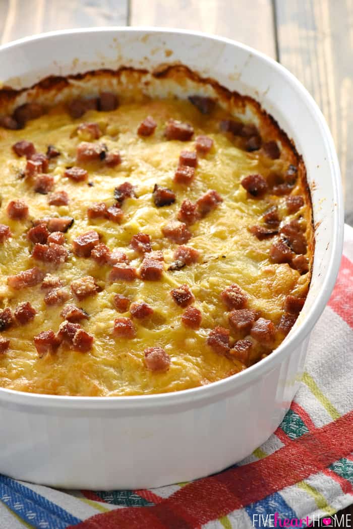 Cheesy Scalloped Potatoes with Ham in Oval White Baking Dish 