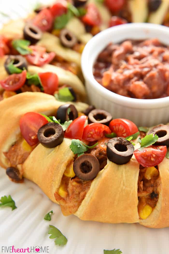 Chicken or Turkey Taco Crescent Ring ~ a delicious way to use up leftover chicken or holiday turkey...mixed with black beans, corn, and cream cheese, flavored with taco seasoning, and wrapped in light, flaky crescent roll dough for an easy yet impressive appetizer or dinner! | FiveHeartHome.com