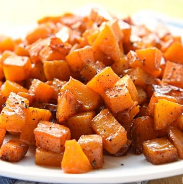 Cinnamon Maple Roasted Squash ~ vitamin-packed butternut squash is coated with coconut oil, maple syrup, and cinnamon, then roasted until tender and sweet for a gorgeous, golden fall or winter side dish! | FiveHeartHome.com