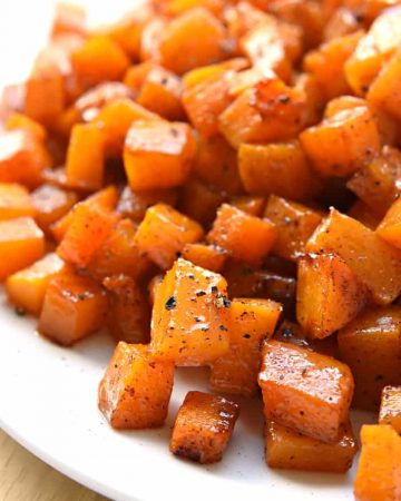 Cinnamon Maple Roasted Squash ~ vitamin-packed butternut squash is coated with coconut oil, maple syrup, and cinnamon, then roasted until tender and sweet for a gorgeous, golden fall or winter side dish! | FiveHeartHome.com