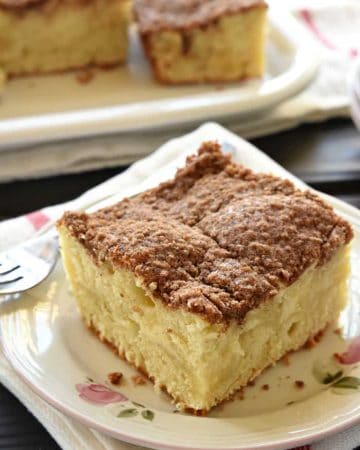 Cream Cheese Coffee Cake ~ swirled with a ribbon of sweet and tangy cream cheese filling and topped with a buttery, cinnamon streusel topping, making it a perfect breakfast, brunch, or coffee time treat! | FiveHeartHome.com