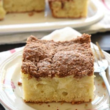 Cream Cheese Coffee Cake ~ swirled with a ribbon of sweet and tangy cream cheese filling and topped with a buttery, cinnamon streusel topping, making it a perfect breakfast, brunch, or coffee time treat! | FiveHeartHome.com
