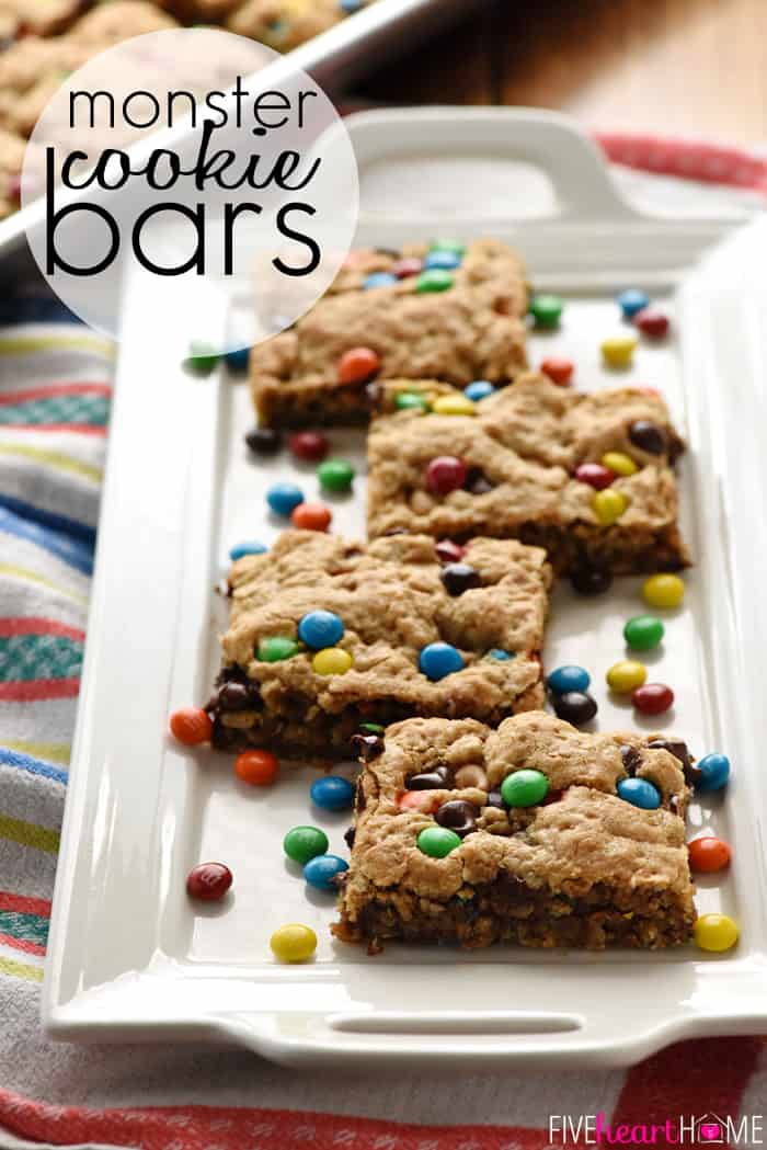 Monster Cookie Bars ~ loaded with chewy oats, decadent peanut butter, colorful M&Ms, chocolate chips, and peanut butter chips, this effortless batter whips up in no time! It's then spread in a large rimmed sheet pan for a BIG batch of bar cookies, perfect for sharing or serving at parties. Even better, you can customize these yummy cookies for various holidays by using seasonal M&Ms! | FiveHeartHome.com