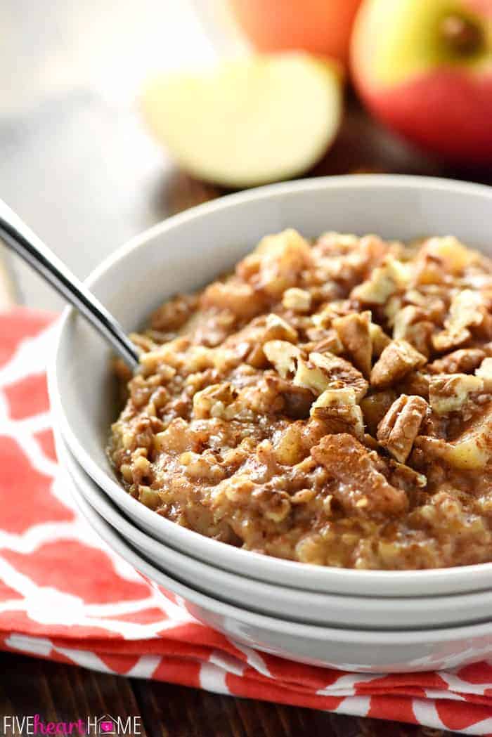 Apple Pie Overnight Steel Cut Oatmeal ~ loaded with steel cut oats and apple cinnamon goodness, this recipe is easy to throw in the slow cooker before bed for an effortless breakfast the next day. And with a special, no-stirring-required trick, you won't have to worry about burnt edges in the morning! | FiveHeartHome.com