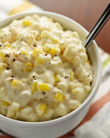 Slow Cooker Creamy Cheesy Corn ~ a rich, comforting side dish that's the perfect addition to any holiday menu...because not only is this recipe delicious, but it also frees up the stove and oven! | FiveHeartHome.com