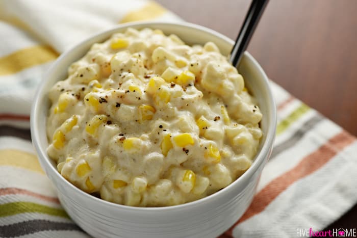 Slow Cooker Creamy Cheesy Corn ~ a rich, comforting side dish that's the perfect addition to any holiday menu...because not only is this recipe delicious, but it also frees up the stove and oven! | FiveHeartHome.com