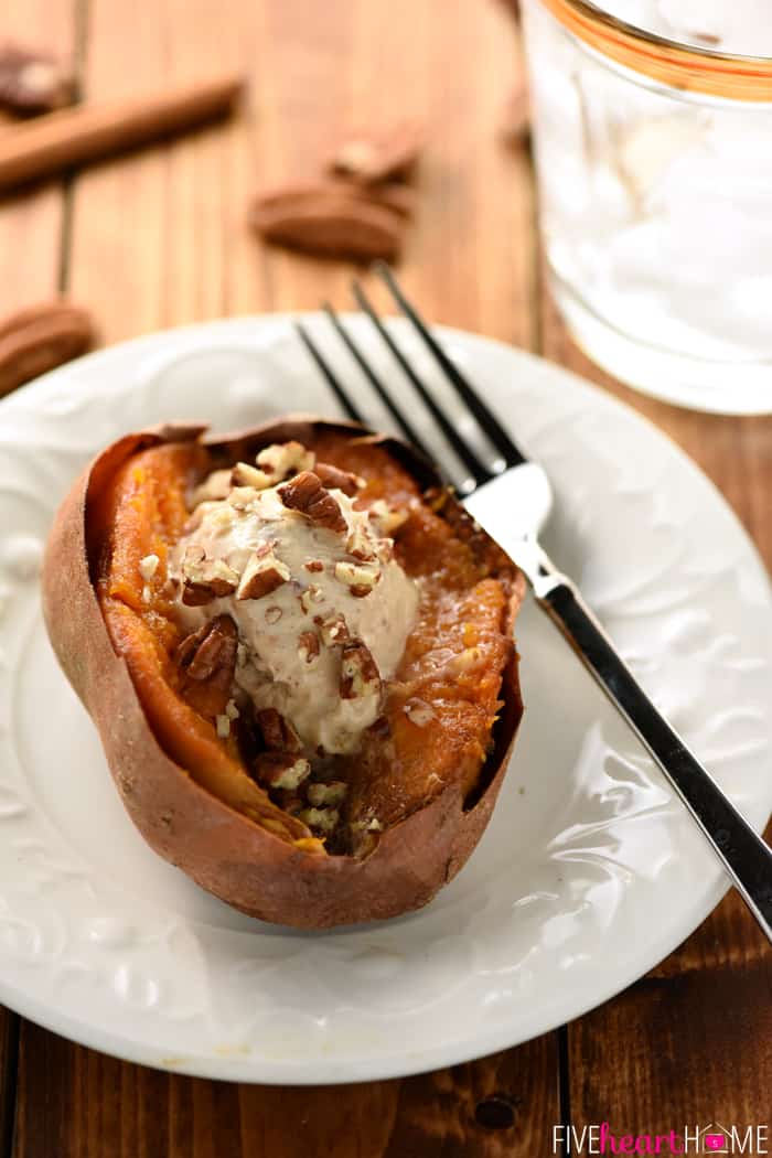 Pecan Praline Honey Butter recipe melting over a sliced sweet potato.