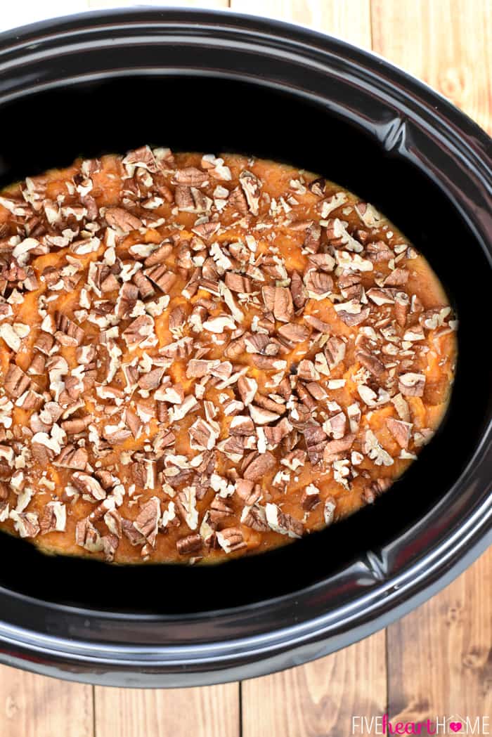 Aerial view of Crockpot Sweet Potatoes with pecans.