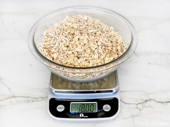 18 ounces of rolled oats measured on a kitchen scale.