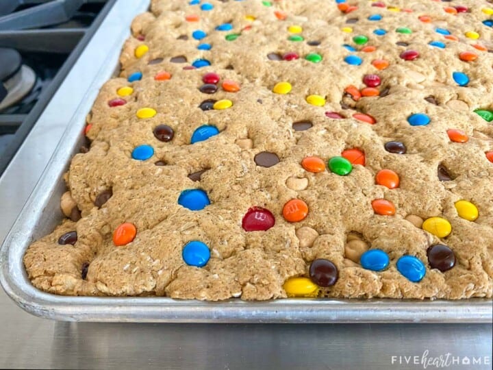 Close-up of baked Monster Cookie Bars in pan.