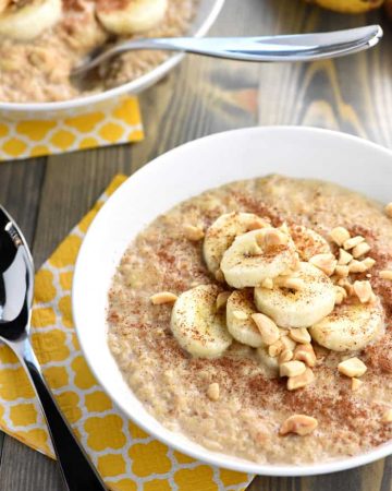 Peanut Butter Banana Oatmeal ~ in just a few short minutes, you can enjoy a hot, wholesome, homemade breakfast flavored with cinnamon, sweetened with honey, and topped with crunchy peanuts! | FiveHeartHome.com