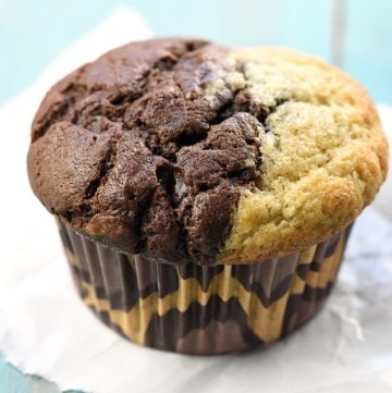 Banana Bread and Chocolate Muffin on turquoise tabletop