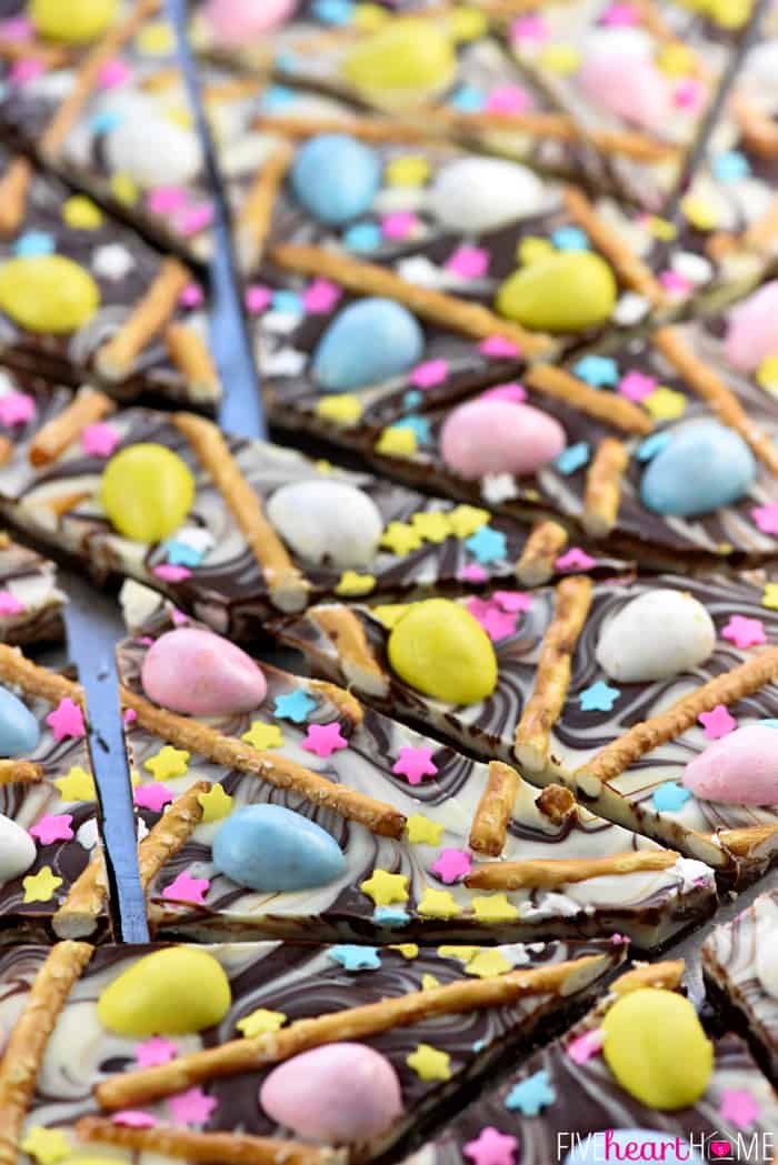 Close-up of Easter Bark topped with mini chocolate eggs and pretzels