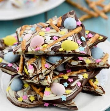 Easter Egg Pretzel Chocolate Swirl Bark ~ a simple, festive, spring treat featuring two kinds of chocolate swirled together and topped with mini chocolate eggs, pretzels, and pastel sprinkles! | FiveHeartHome.com