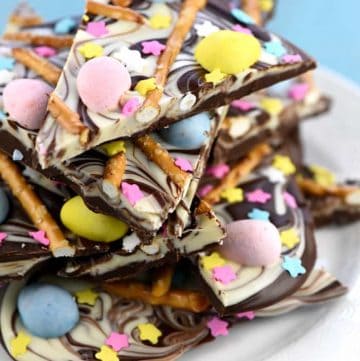 Easter Egg Pretzel Chocolate Swirl Bark ~ a simple, festive, spring treat featuring two kinds of chocolate swirled together and topped with mini chocolate eggs, pretzels, and pastel sprinkles! | FiveHeartHome.com