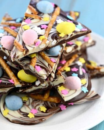 Easter Egg Pretzel Chocolate Swirl Bark ~ a simple, festive, spring treat featuring two kinds of chocolate swirled together and topped with mini chocolate eggs, pretzels, and pastel sprinkles! | FiveHeartHome.com