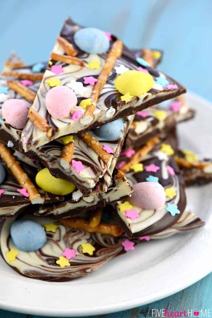 Easter Egg Pretzel Chocolate Swirl Bark ~ a simple, festive, spring treat featuring two kinds of chocolate swirled together and topped with mini chocolate eggs, pretzels, and pastel sprinkles! | FiveHeartHome.com