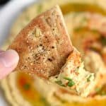 Roasted Garlic Hummus ~ mellow roasted garlic is blended with chickpeas, tahini, olive oil, and lemon juice for a fresh, creamy hummus that's delicious with homemade pita chips or crunchy veggie dippers! | FiveHeartHome.com