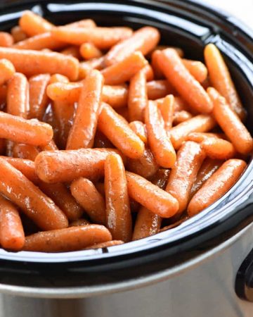 Honey Cinnamon Crockpot Carrots in slow cooker.