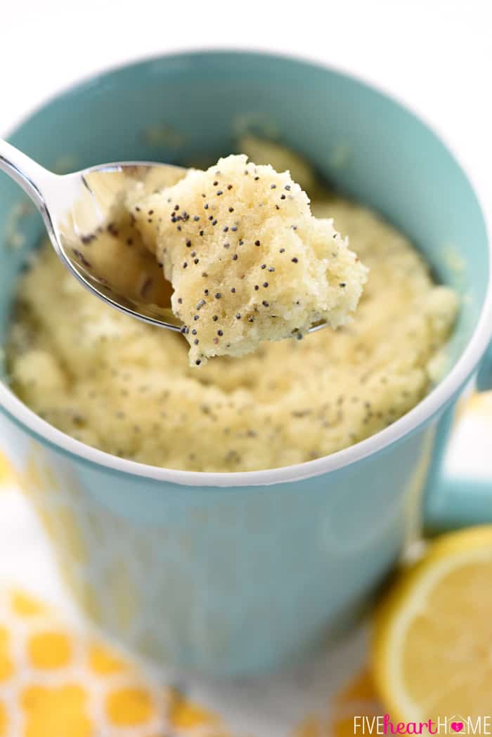 Spoonful of Lemon Mug Cake lifted out of mug