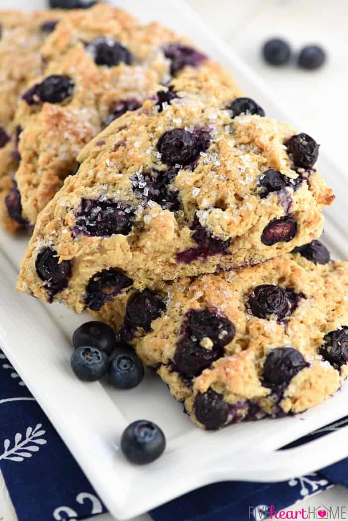 Whole Wheat Scones piled on white serving platter.