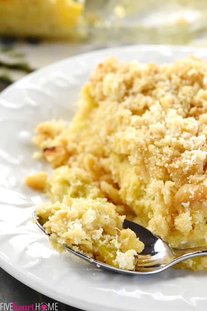 Close-up of Squash Casserole recipe in spoon and on plate.