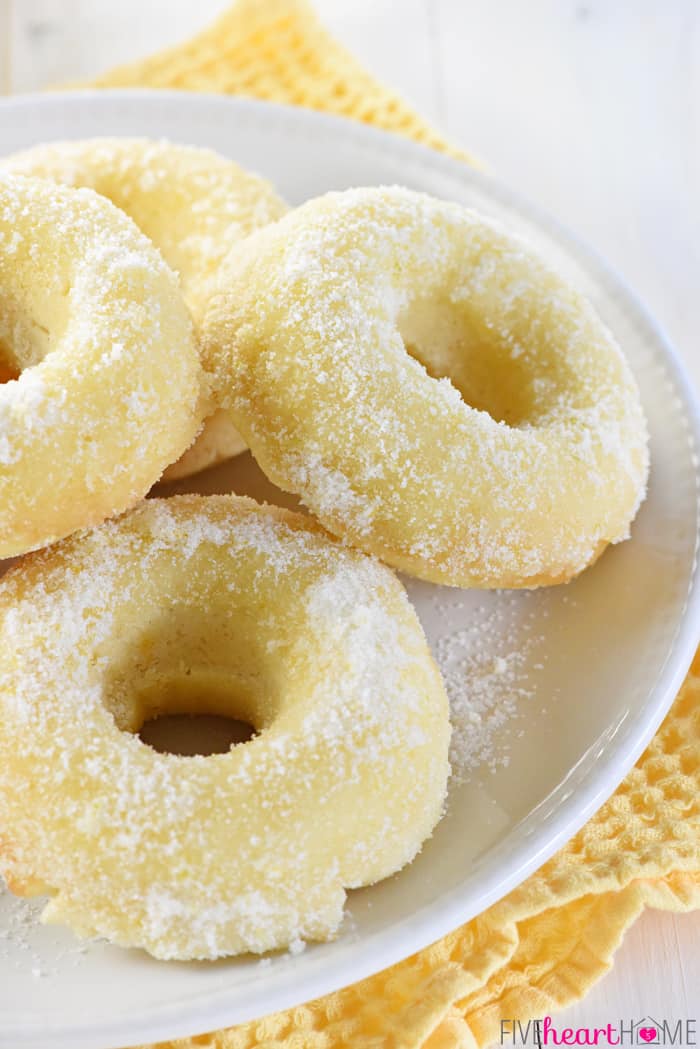 Close-up of baked donuts on plate.