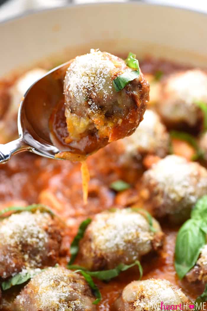Spoon scooping up a Parmesan Meatball.
