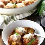 Parmesan Meatball Skillet ~ this easy-to-make, family-pleasing ground beef recipe features tender baked meatballs simmered in marinara and smothered with cheese, delicious served over pasta or piled on meatball subs! | FiveHeartHome.com