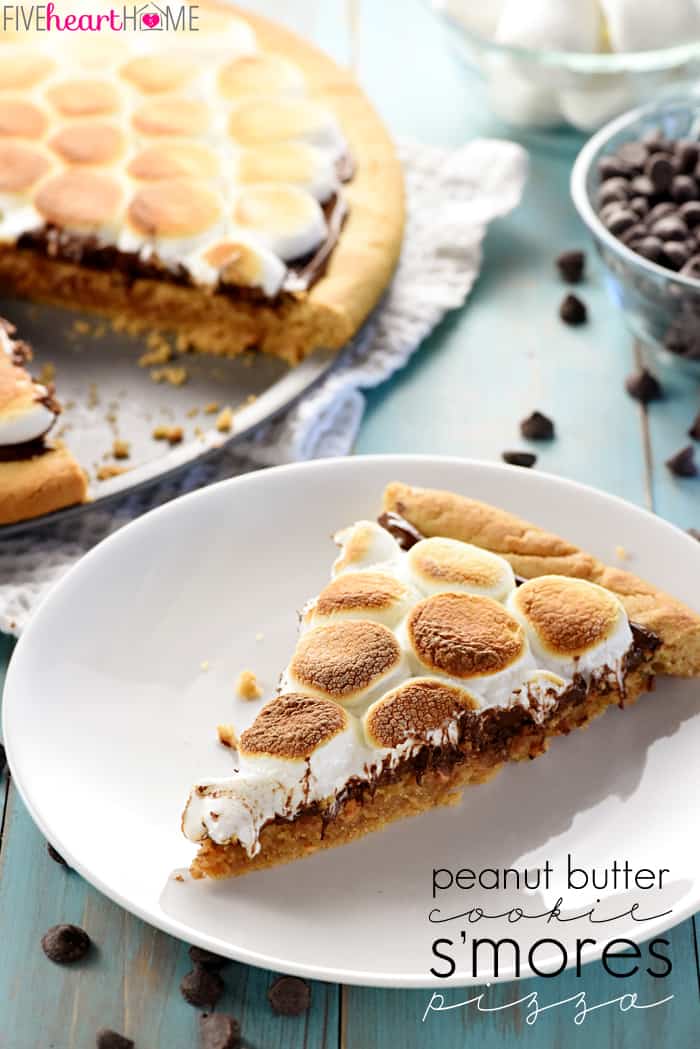 Peanut Butter Cookie S'mores Pizza ~ melted chocolate and toasted marshmallows top a thick, chewy, homemade peanut butter crust in this fun and decadent dessert recipe that's perfect for summer parties or year-round special occasions! | FiveHeartHome.com