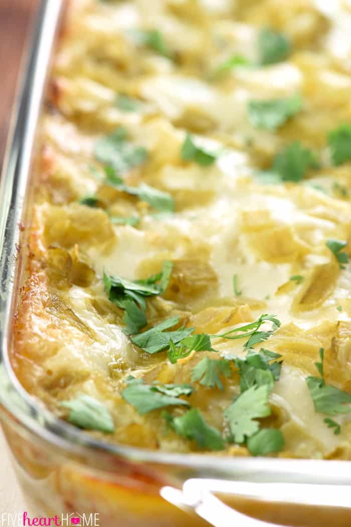 Chicken Enchilada Casserole ~ with all-natural ingredients like salsa verde, green chiles, and a creamy homemade sauce, this scrumptious stacked casserole recipe boast the great flavor of chicken enchiladas without the work of rolling them! | FiveHeartHome.com