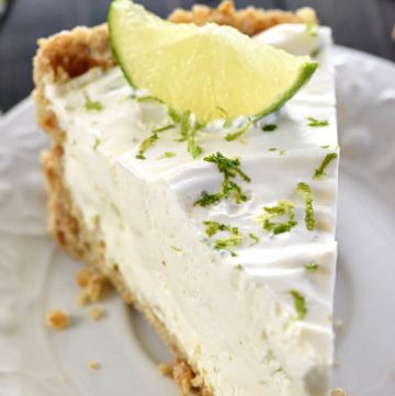 No-Bake Frozen Margarita Pie ~ cool and creamy, with a salty-sweet pretzel crust and a frosty filling flavored with fresh lime juice, tequila, and triple sec...or leave out the liquor and boost the lime juice for a family-friendly variation! | FiveHeartHome.com