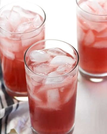 Three glasses of Homemade Gatorade with ice.