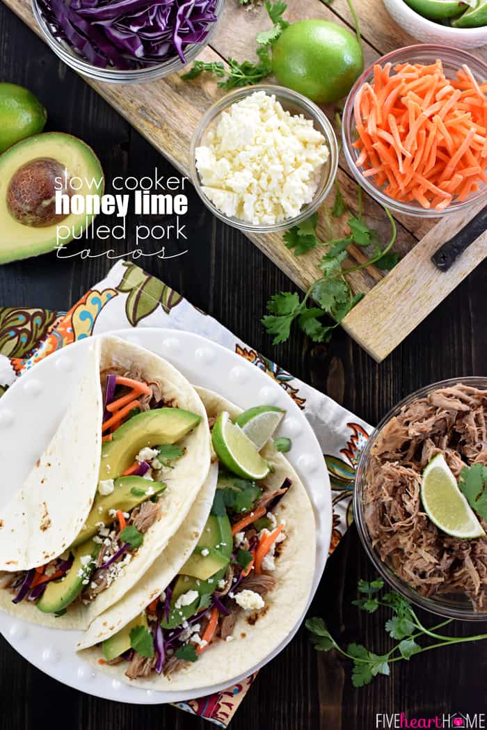 Slow Cooker Honey Lime Pulled Pork Tacos ~ tender, spicy-sweet pork piled on flour tortillas and topped with red cabbage, carrots, avocado, cotija cheese, and fresh cilantro for an easy, effortless dinner...and the leftover pork is fantastic on nachos! | FiveHeartHome.com