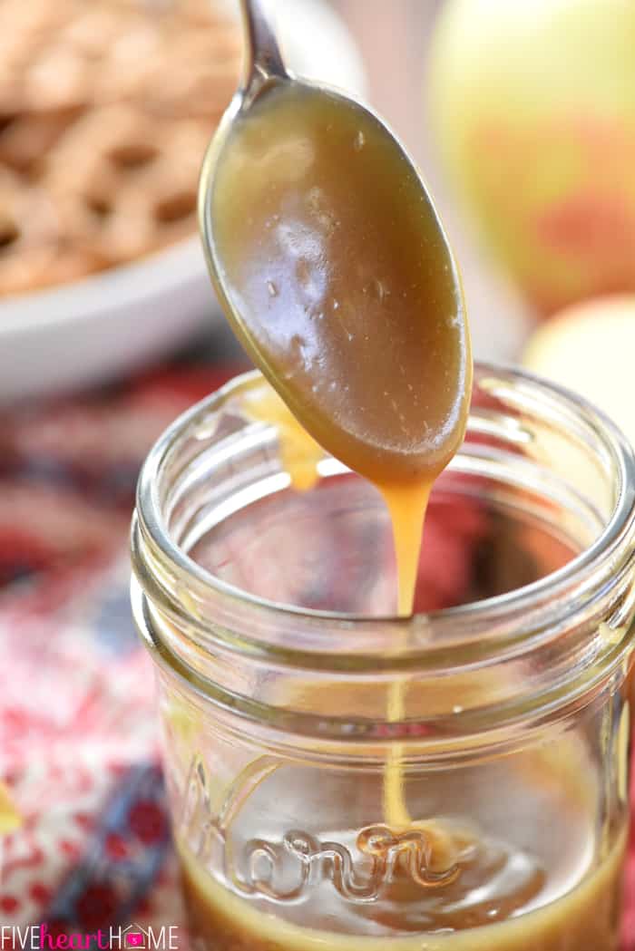 Spoonful of Caramel Drizzling from Spoon into Jar 